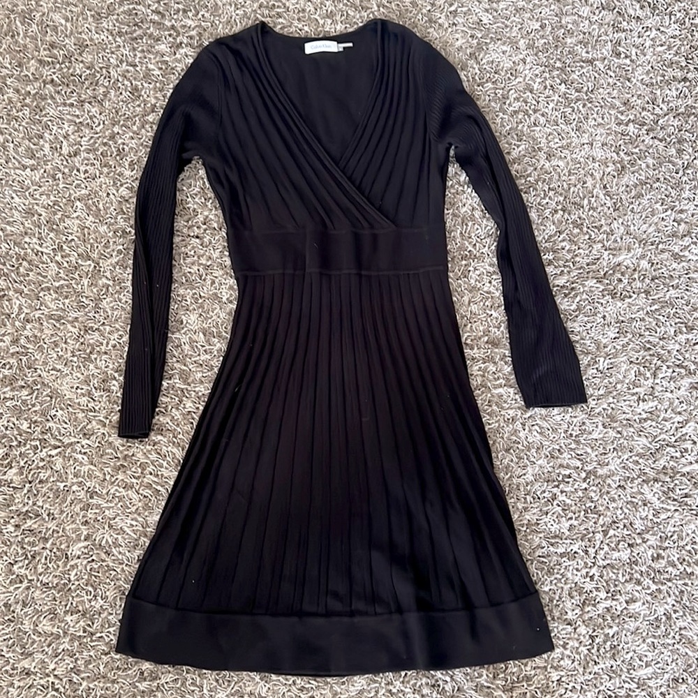 Black, knee length, Calvin Klein sm. Beautiful, ribbed patterning. Never worn.